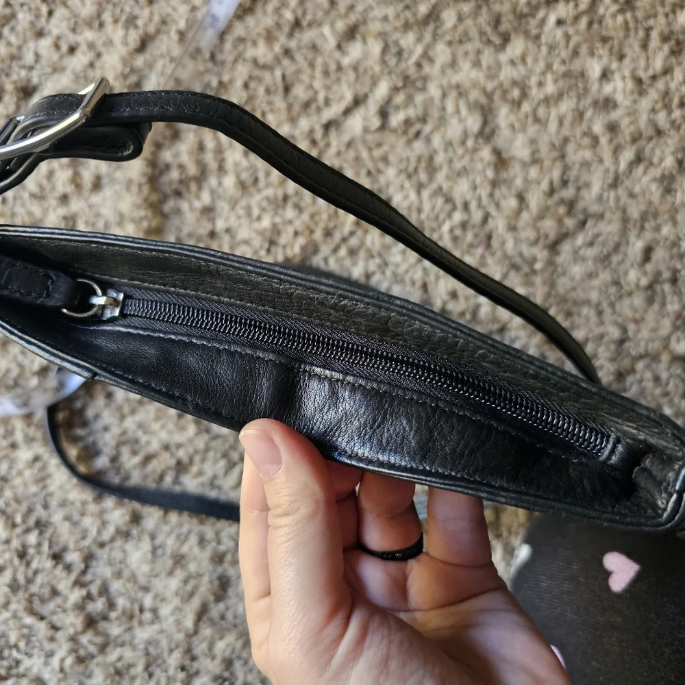 Margot black leather crossbody bag with corner pocket on‎ a front